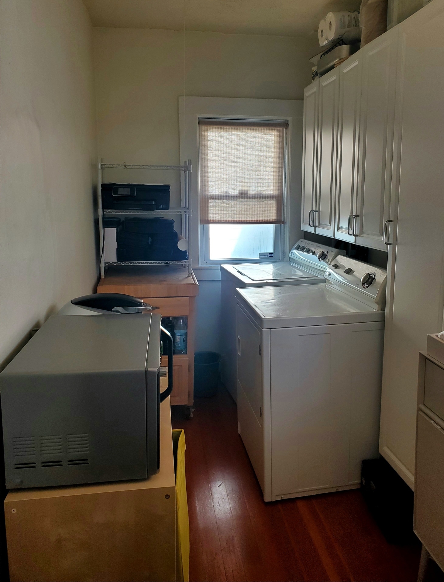 In-unit laundry room. Additional storage. Conveniently located off kitchen. - 59 Cameron Ave
