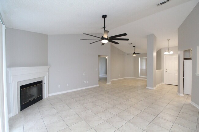 Building Photo - West Pensacola Brick Home with Vaulted Ceilings, Split Floor Plan, Open Living Design & Easy Acce...