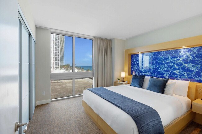 Building Photo - 18683 Collins Ave