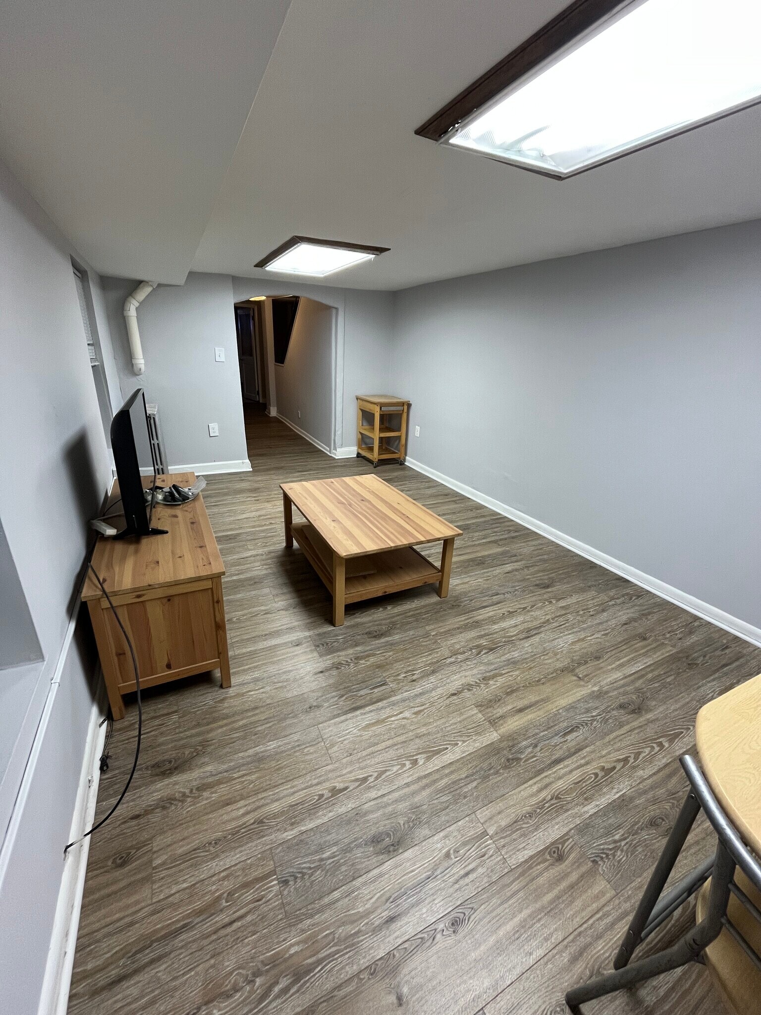 Lower Level Livingroom - 118 S Washington St