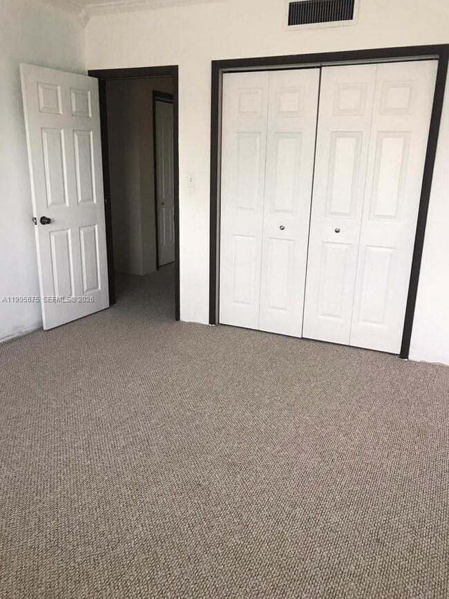 Building Photo - 701 S Royal Poinciana Blvd