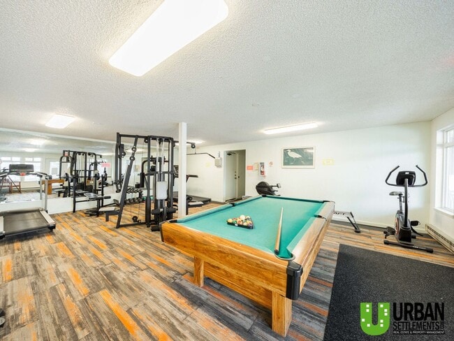 Building Photo - Comfortable 1-Bedroom Condo with Parking & Resort-Style Amenities