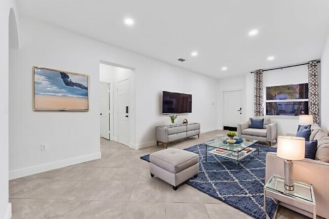 Building Photo - Stunning lakefront townhouse in gated Homestead community.