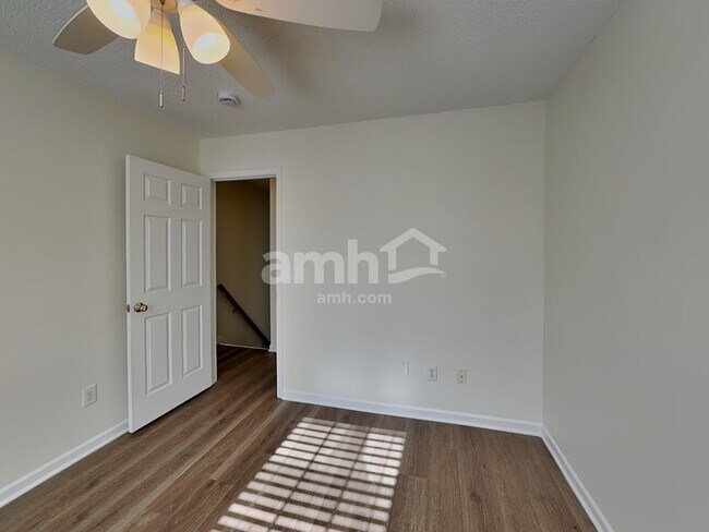 Building Photo - 5202 Carriage Woods Dr