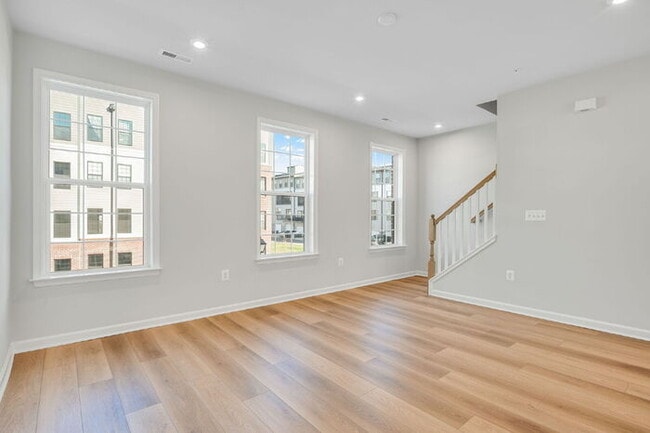 Building Photo - Be the First to Live Here! Brand-New 3BR Condo in Coalfield Station – Modern Living in the Heart ...