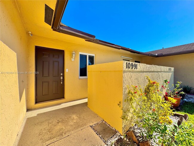 Building Photo - 10991 NW 30th Pl