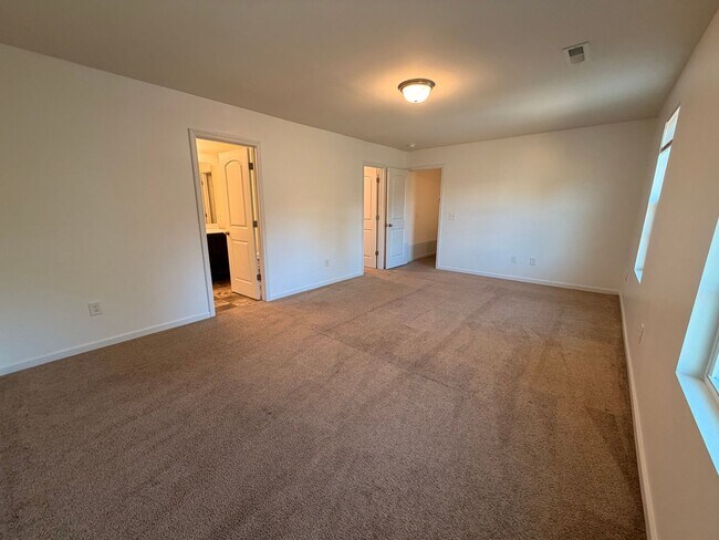 Building Photo - Available Now – Spacious 4BR Home on 1.5 Acres in Rural Hall!