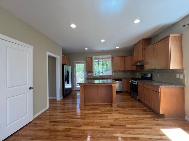 Building Photo - Spacious 4 Bedroom Home with Zen Backyard and 3-Car Garage