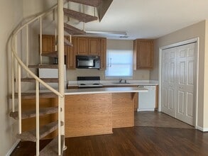 Building Photo - Courtyard Condominiums 14 & 16