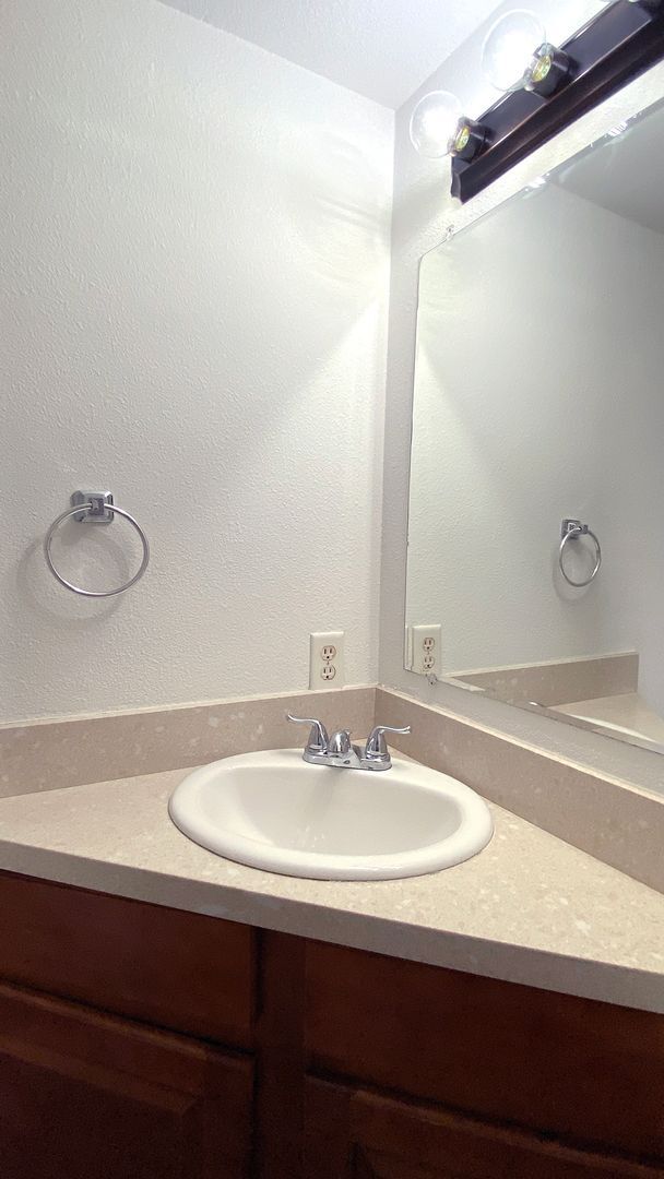 Building Photo - Great 3 bedroom and 1.5 bath townhouse with a small yard and 2 car garage.