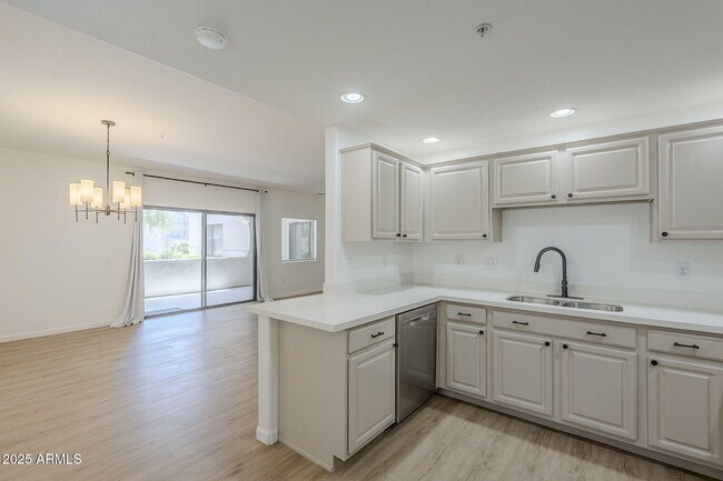Building Photo - 9455 E Raintree Dr
