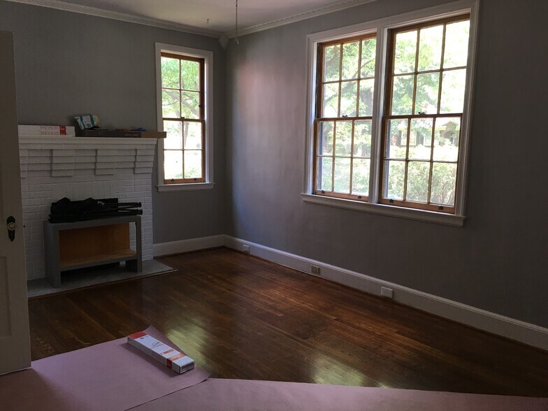 Nice lighted living room with ceiling fan. - 2603 Kiawah Ave