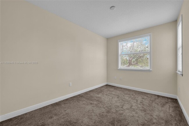Building Photo - 4088 W Palm Aire Dr