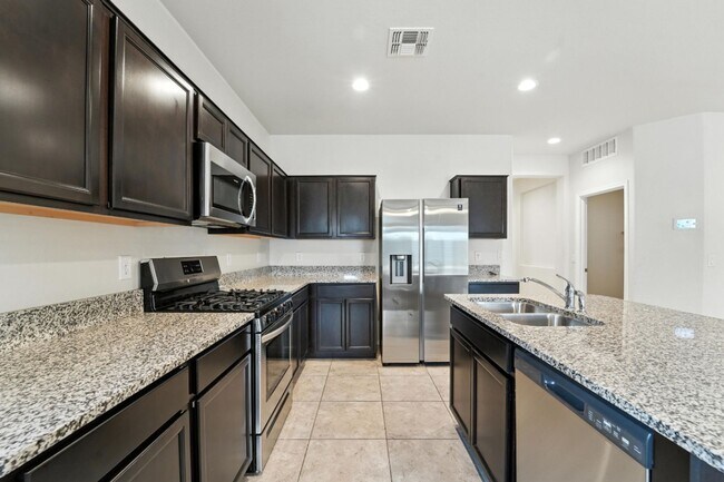 Building Photo - Rare Find! Spacious 3-Bed, 2-Bath + 3-Car ...