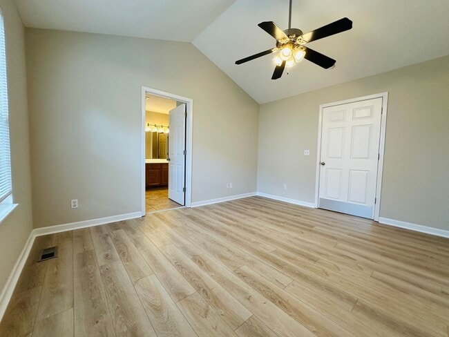 Building Photo - 2 bed, 2.5 bath updated townhouse w/ 1-car garage & Trex deck available now