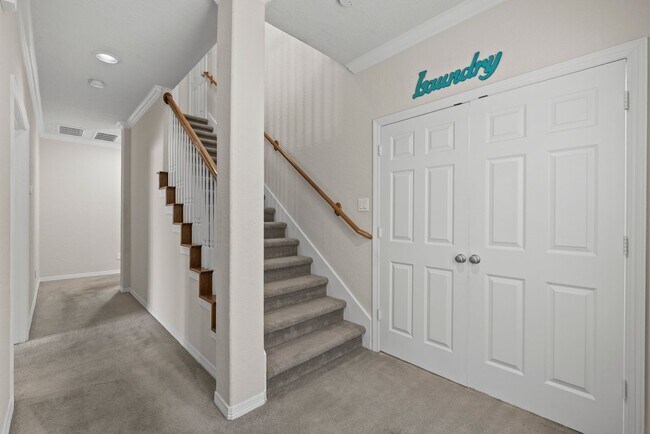 Building Photo - Luxury Townhome with Attached Garage & Outdoor Entertaining Area - $100 off first and second mont!