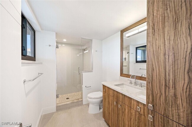 Building Photo - 6075 Pelican Bay Blvd
