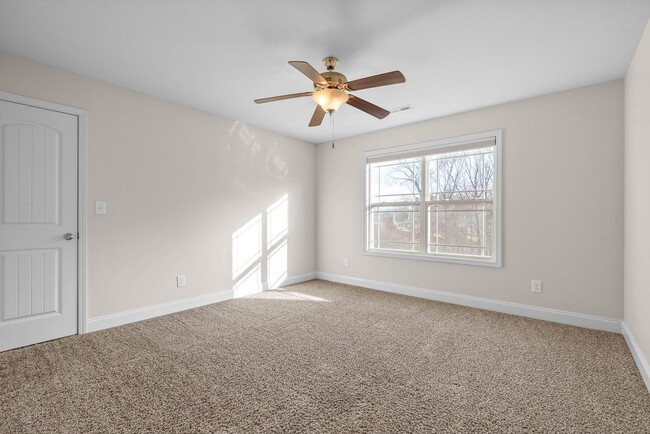 Building Photo - Pet Friendly Three Bedroom with Bonus!