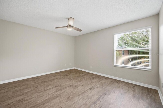 Building Photo - Location! Beautifully located condo just minutes from Orlando International Airport,