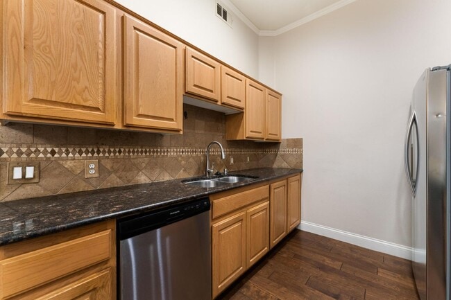 Building Photo - Upgraded condo in gated community