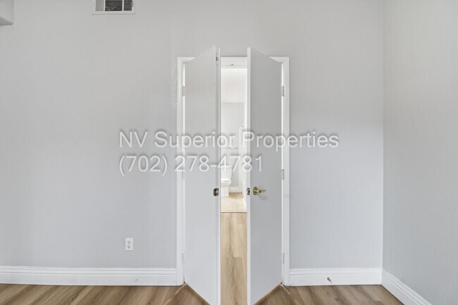 Building Photo - SW!!! 2 Bedroom Condo 1st Floor!! 2 Garage!! Gated!! Community Pool!! Fitness Room!! 2 Primary Be...