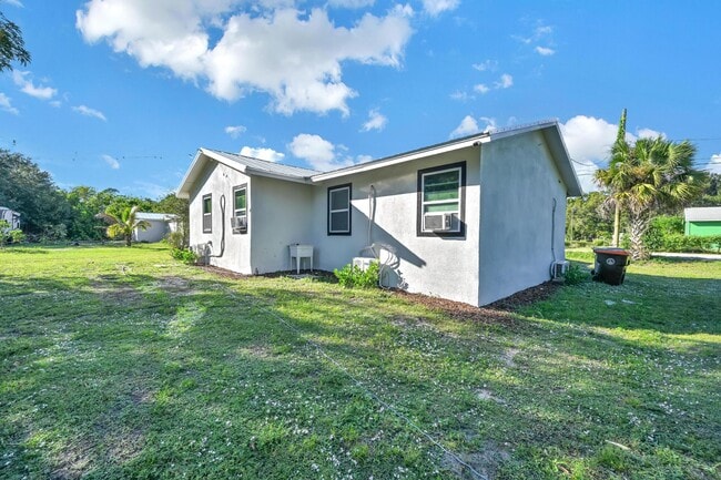 Building Photo - 6385 86th Ln