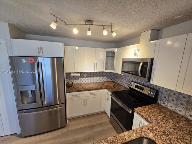 Building Photo - 740 SW 99th Ct Cir