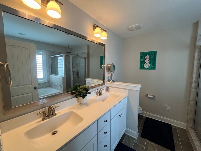 Building Photo - Exceptional 4BD, 2.5BA Cary Townhome with 2-Car Garage, Bonus 2nd Floor Living Space, and Private...