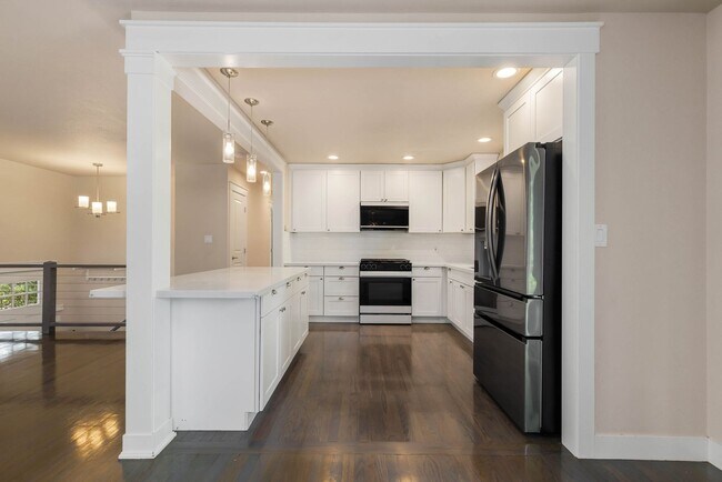 Building Photo - Updated Split-Level Home with Flexible Living Spaces & Backyard Deck