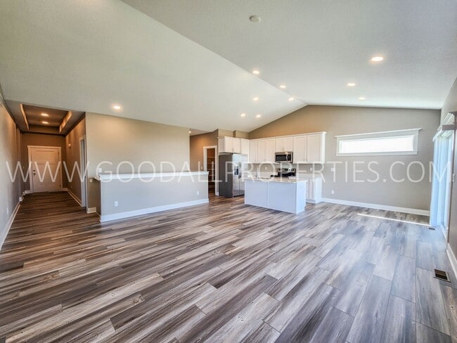 Building Photo - Spacious Waukee Ranch | 4 Bedrooms | 3-Car Garage | Finished Basement
