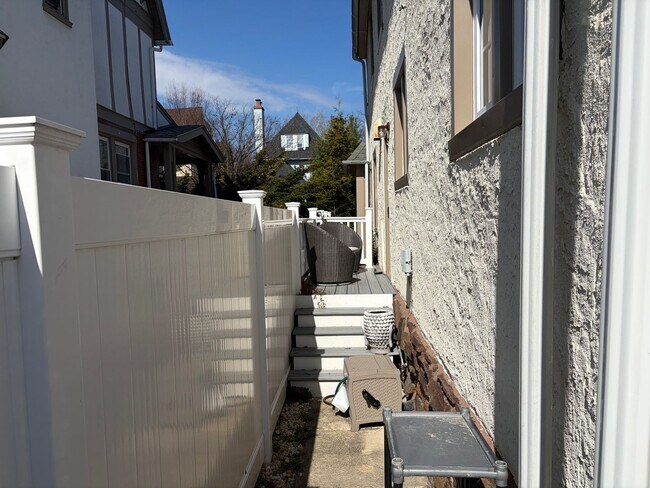 Building Photo - Elegant 3 Story Brick Corner Property Now Available