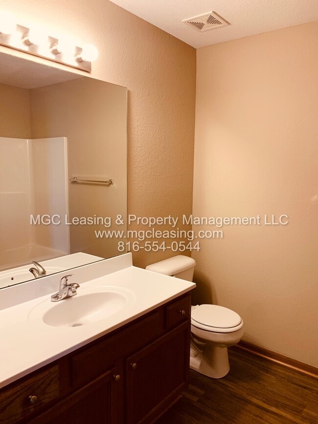 Building Photo - Charming Brick Ranch Duplex in the Heart of Lone Jack - Ready Now