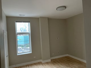 Main bedroom has large closet and larger window. - 725 N Aberdeen St