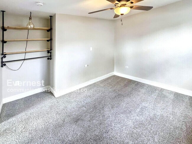 Building Photo - Gorgeous 5-Bedroom Duplex with Fenced Yard...