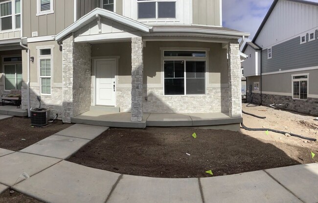 Building Photo - Nearly New Lehi Row End Townhome W 2 attac...