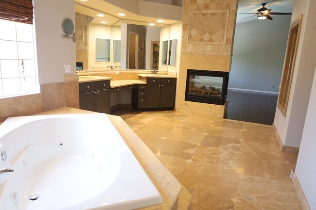 Building Photo - Fully Upgraded 5 Bedroom 4.5 Bathroom in Guard Gated Foothills Community!