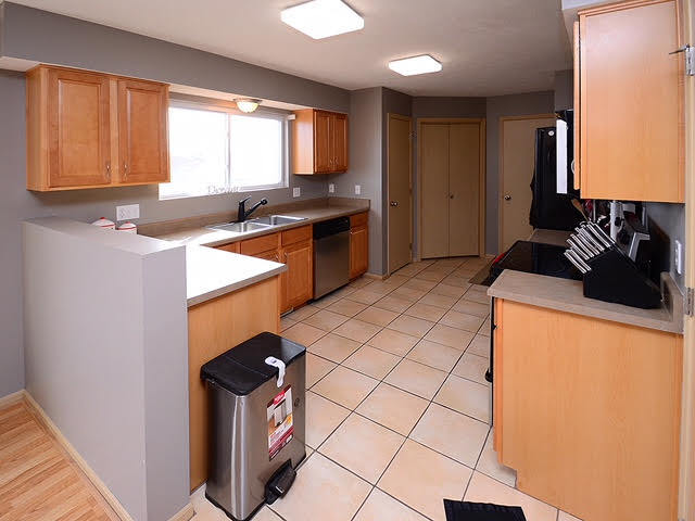 Large kitchen with lots of natural light. - 6965 N 88th St