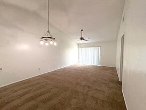 Building Photo - Charming 2-Bed, 2-Bath Home with Vaulted Ceilings & Pool View!