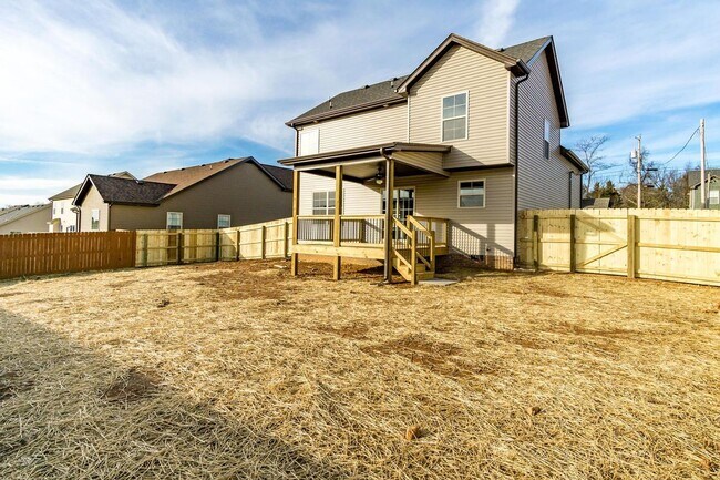 Building Photo - Pet Friendly Three Bedroom with Bonus!