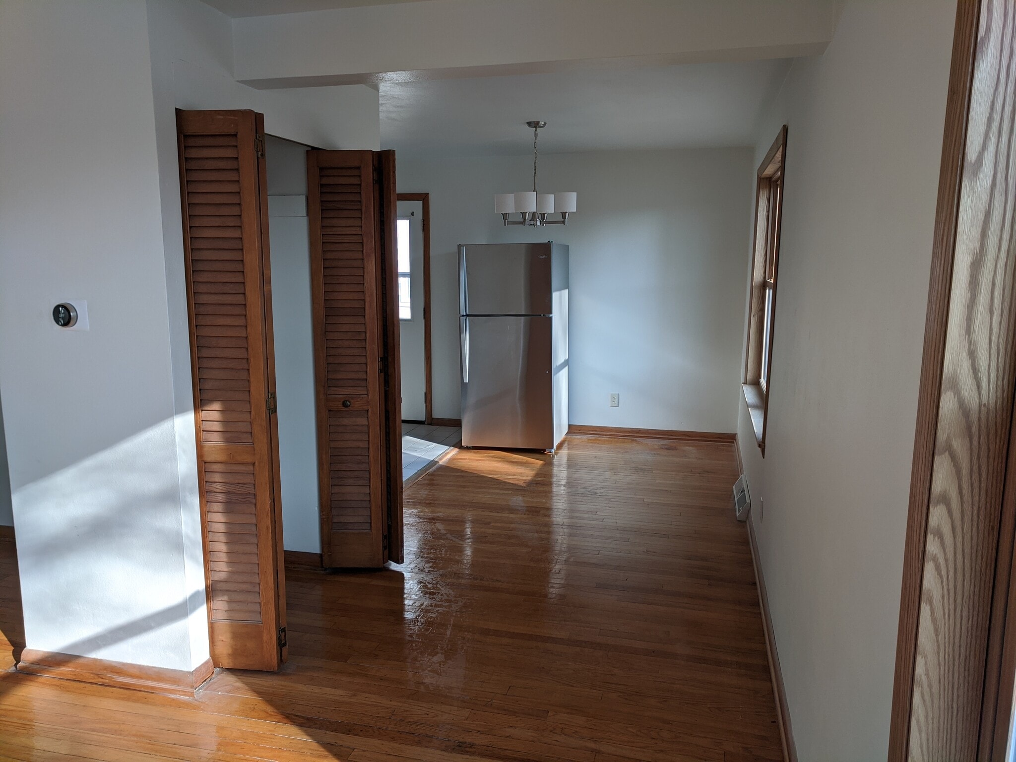 Looking towards dining and kitchen, from living room. - 2306 Hoard Street