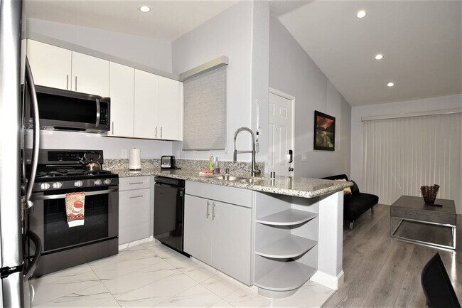 Building Photo - 5415 W Harmon Ave