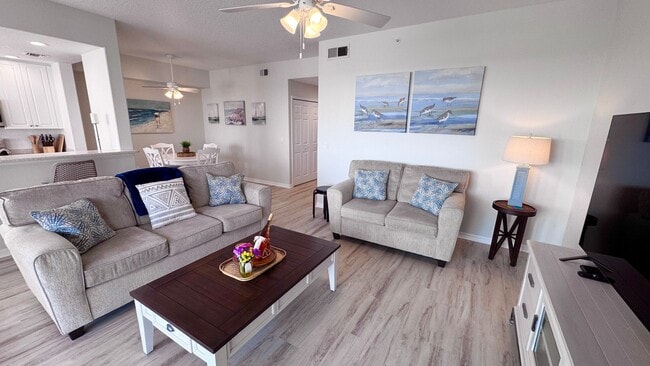 Building Photo - Elevated Luxury at The Terraces – 4th Floor Lake & Golf Course Views! 55+ Community!