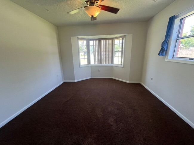 Building Photo - Charming 4-Bedroom Brick Home on Spacious ...