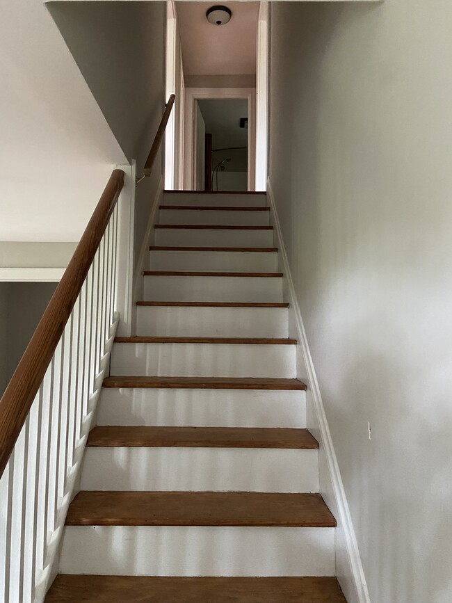 staircase to upstairs bedrooms - 12664 Polktown Rd