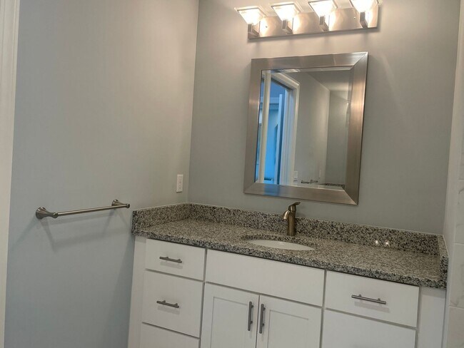Building Photo - Coastal Luxury at Hidden Bay | 3BR Waterfront Condo with Bay Views