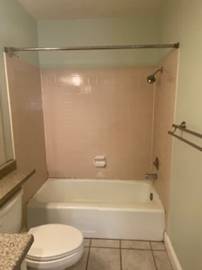 Building Photo - Huge semi-private Backyard with Large Patio!