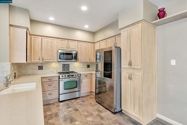 Building Photo - Updated Mediterranean-style home in Renais...