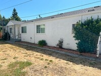Building Photo - CHARMING 1bd/1ba DUPLEX TUCKED AWAY OFFTHE...