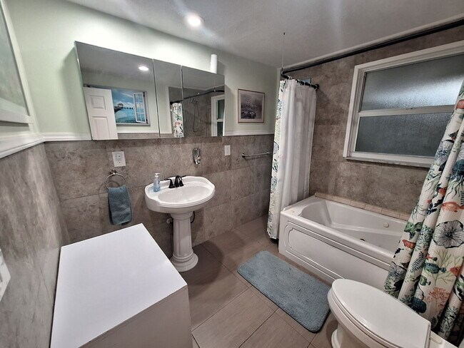 Building Photo - Gulf Access Home on Canal Available Now