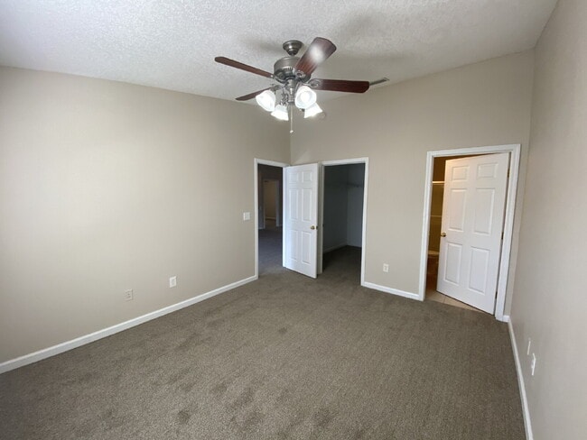 Building Photo - Beautifully Updated & Spacious 3BR/2BA Condo in a Secure Gated Community — Includes Cable, Intern...